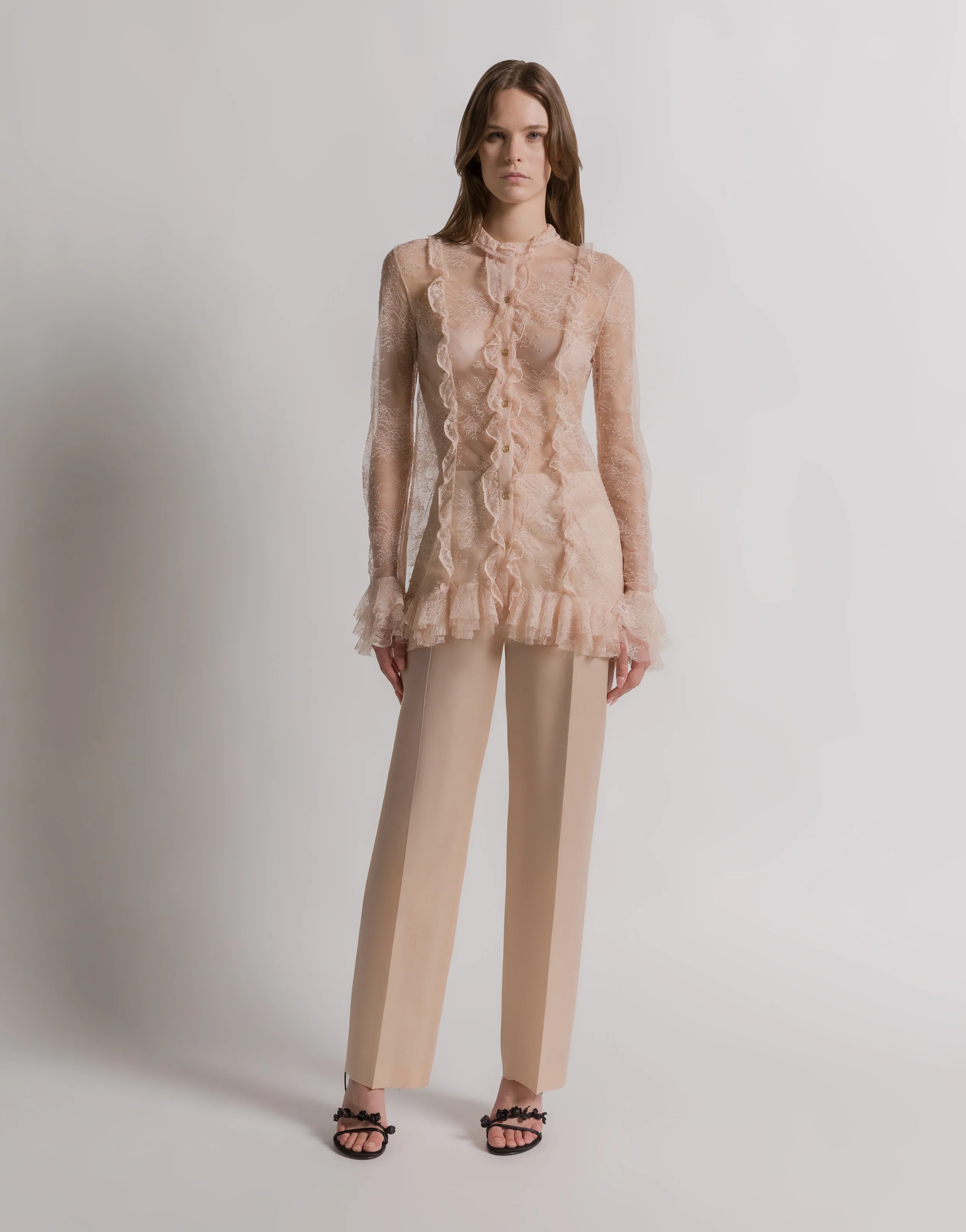 Blusa in pizzo trasparente