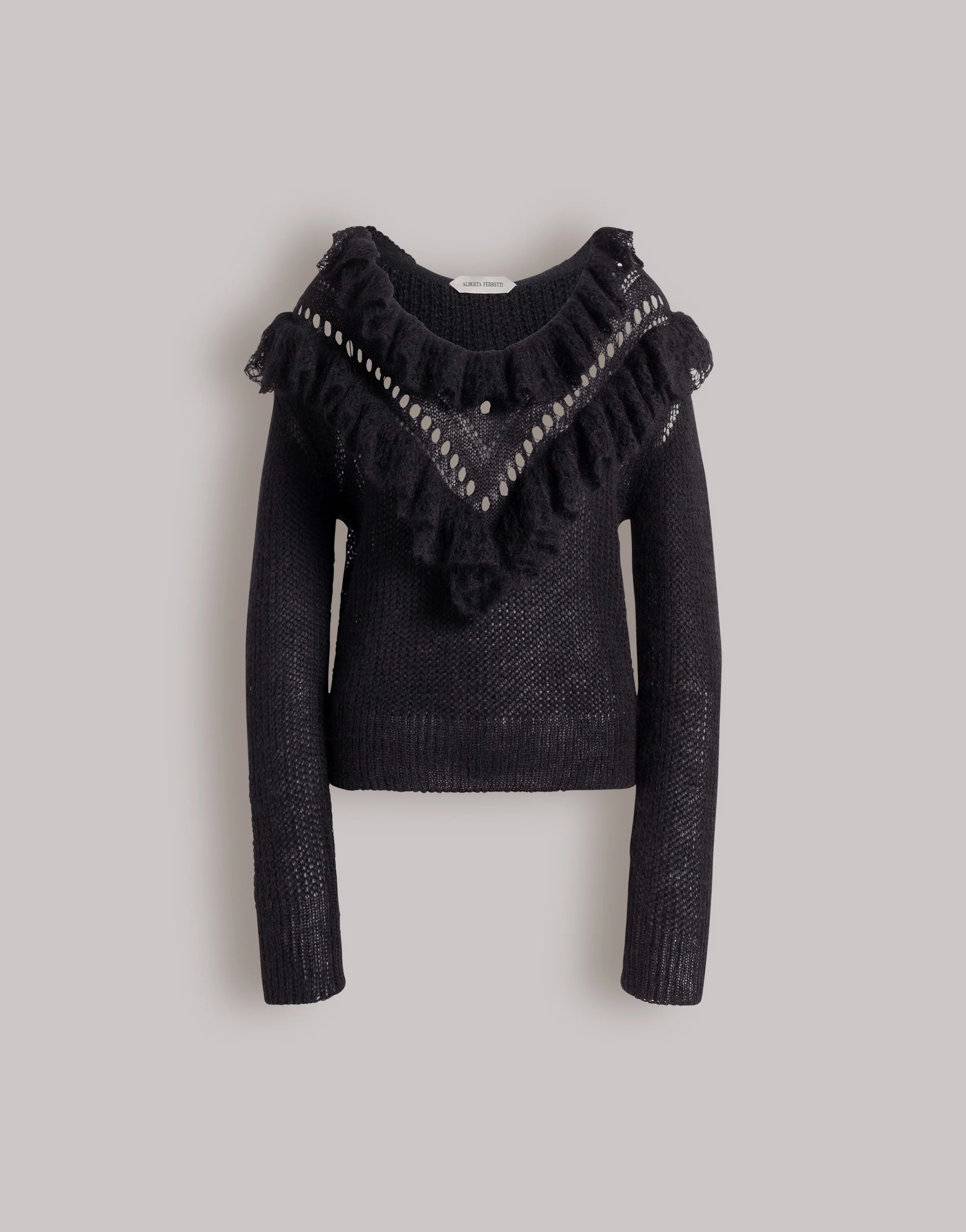 Maglione con volant in lana merino
