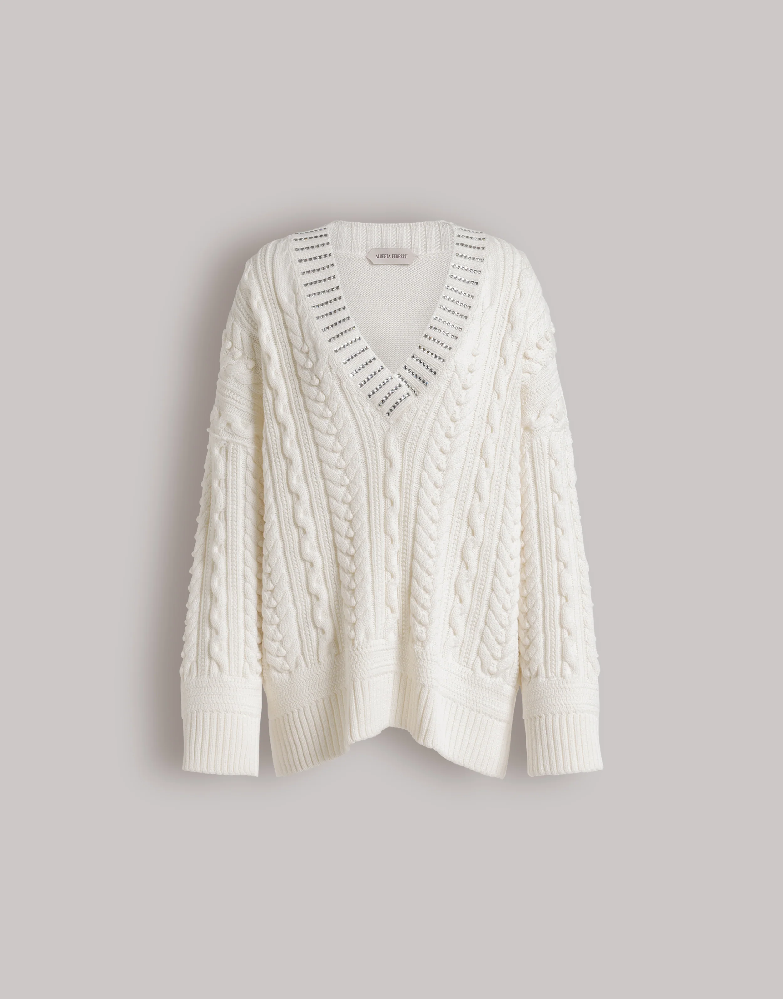 Maglione in maglia Aran con collo in paillettes