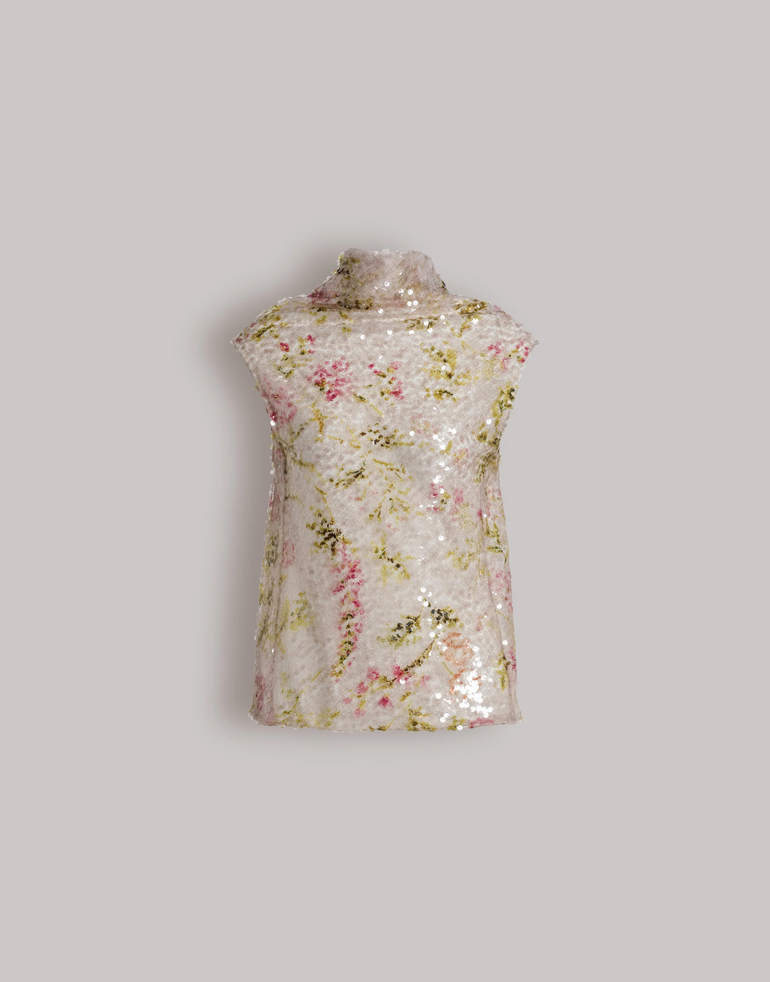 Top con paillettes a motivo floreale